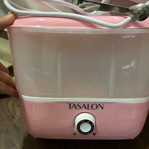 Pink towel steamer for pedicures or facials